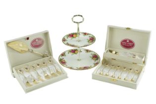 A Royal Albert Old Country Roses cake stand and cased cutlery