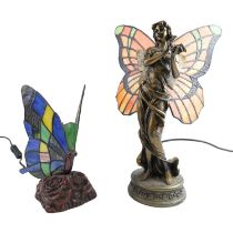 A figural cold cast table lamp, modelled as an angel having leaded glass wings, requires a small