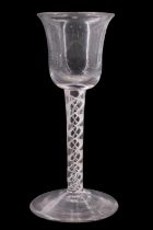 A mid 18th Century mixed twist stemmed wine glass, having a bell-shaped bowl and twin double