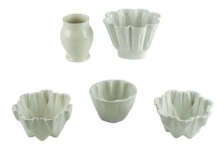 Four ceramic jelly moulds, comprising two Maling, a Shelley and one other, together with a similar