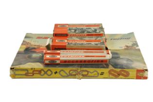 A vintage Champion Motor Racing slot car game by Playcraft together with boxed accessories, circa