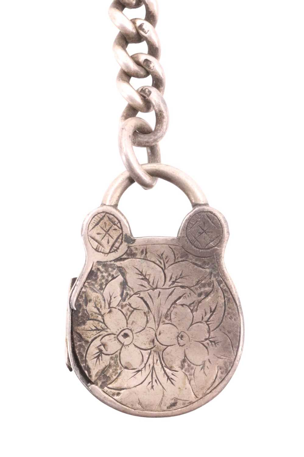 A Victorian silver graduated curb-link watchchain, with a floral engraved locket, Birmingham, - Image 2 of 3