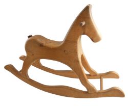 A pine rocking horse by Dorfgemeinschaft Lautenbach of Germany, 90 x 23 x 61 cm