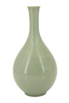A 20th Century Korean celadon green bottle vase, of teardrop form having a tall slender neck, 25 cm