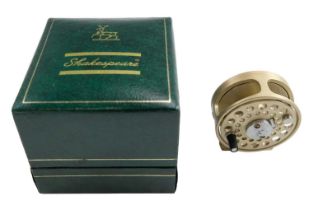 A cased Shakespeare miniature Worcestershire fly fishing reel, 3 cm