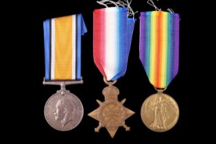 A 1914-15 Star, British War and Victory Medals to 2801 Pte E Holland, King's Liverpool Regiment,