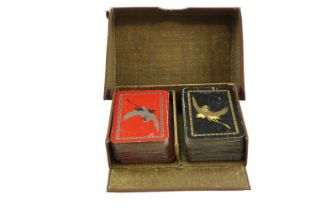 A 1920s boxed double set of patience playing cards by Goodall & Son Ltd