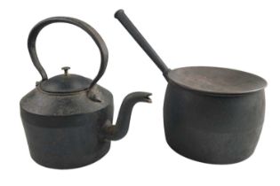 An early 20th Century No 4 cast iron kettle together with a similar cast iron saucepan by Kenrick,
