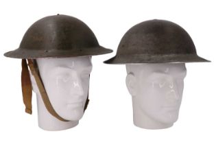 A Second World War British army Mk II steel helmet, its shell inscribed with its original RASC