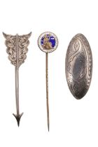 Two late 19th / early 20th Century white metal brooches, comprising an oblate brooch having