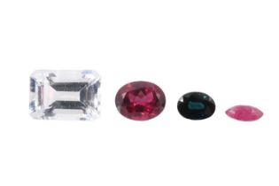 Four loose gemstones, comprising aquamarine, ruby, sapphire and garnet, aquamarine 14 x 10 mm