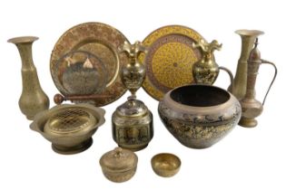 A quantity of Indian brassware including a dinner gong, plates, vases, etc, 25.5 cm tallest