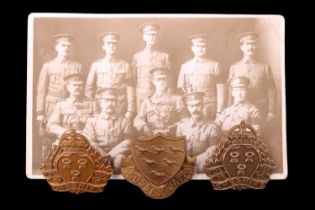Cheshire and Sussex Volunteer Training Corps cap badges together with a related photographic