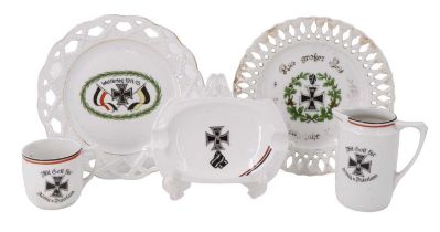 Five items of Imperial German patriotic porcelain each emblazoned with an Iron Cross, largest