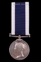 A Victorian Royal Navy Long Service and Good Conduct medal to J H Buscombe, P O 1st Class, HMS