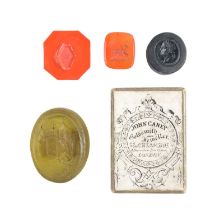 A 19th Century glass seal matrix, intaglio engraved in depiction of a shepherdess with a lamb, a