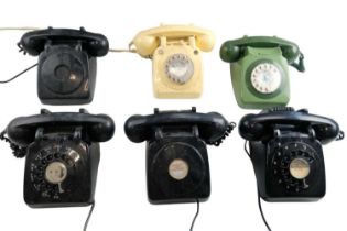 Six 1960s and later 700 series telephones, including rotary dials, dummy dials and a rotary dial