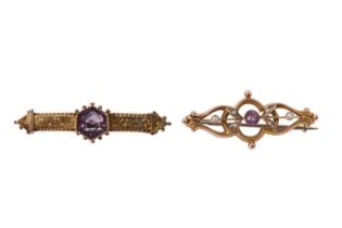 Two Victorian amethyst brooches, comprising a 9 ct gold bar brooch set with a hexagonal stone and