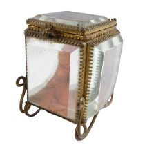 A late 19th Century gilt metal and glass watch stand / vitrine in the form of a sedan chair,