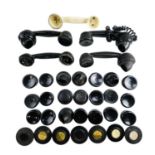 A quantity of 300 series Bakelite telephone handsets, ear and mouthpieces, dummy dials, etc