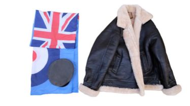 A post-War RAF peaked cap, an RAF flag and a sheepskin flying jacket, (zip a/f)