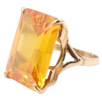 A mid 20th Century heliodore dress ring, the 18 x 13 mm rectangular princess cut on an open four