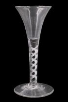 A mid 18th Century multiple spiral air twist wine glass, of drawn trumpet form with double spiral
