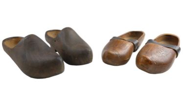 Two pairs of wooden clogs