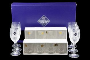 A boxed set of Edinburgh Crystal International wine glasses together with four Provence whisky