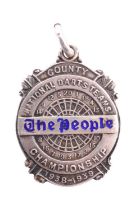 An enamelled silver fob medal for the National Darts Teams Championship 1938-1939 "The People",