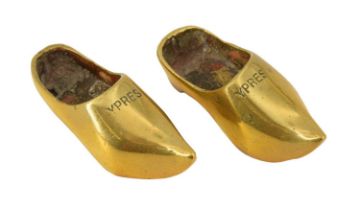 A pair of miniature brass clogs inscribed "Ypres", 6 cm