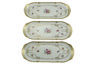 Three late 20th Century floral and gilt sandwich plates by Reichenbach, Thuringia, 38 cm x 15 cm