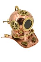 A mid-to-late 20th Century copper and brass model of a diver's helmet, 17 cm high