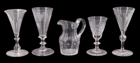 An early 19th Century wheel-cut ale glass together with two wine glasses, one having a hollow ball