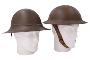 A Second World War British Civil Defence Mk II No 2D steel helmet together with a Fire Watcher's