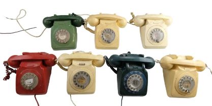 Seven 700 series rotary dial telephones, marked '746 F' and '746 GEN'