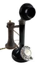 A 1920s / 1930s Vulcanite, enamelled steel and brass rotary dial candlestick telephone