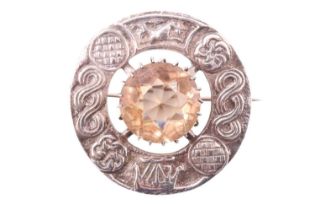 A Scottish Celtic influenced silver plaid brooch by Robert Allison, comprising an annulus relief-