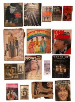 A group of The Beatles books and ephemera, including "The Beatles - An Illustrated Record", "The