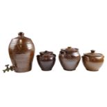 A group of Victorian / early 20th Century salt-glazed stoneware, including lidded jars, a barrel