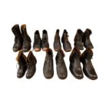 Seven pairs of late 19th / early 20th Century clogs / boots