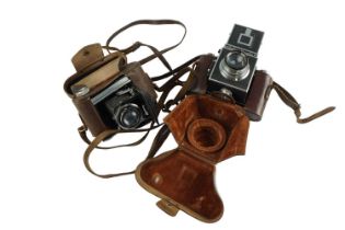 A Reflex-Korelle camera together with a Voigtlander Bessa 46