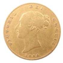 An 1855 gold half-sovereign coin