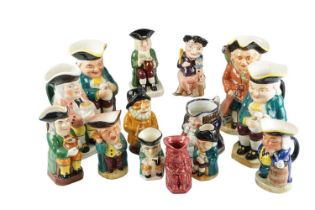 Two mid-to-late 20th Century musical character jugs by Reuge together with twelve other character