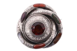 A Victorian / Edwardian Scottish polished hardstone 'Pebble' brooch / pendant, having a 13.5 mm