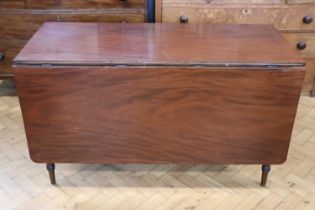 A George III mahogany drop leaf table, 131 x 62 x 74 cm closed, (131 x 155 open cm)