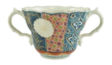 A late 18th Century Worcester two handled chocolate cup in the 'Japan' pattern, pseudo character