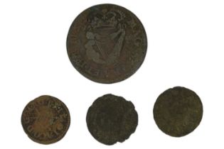 A group of Irish coins, comprising a Charles II 1680 half penny, a James I and two Charles I