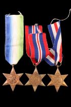 Three Second World War British military campaign medals including an Atlantic Star