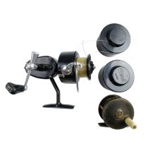 A Mitchell fishing reel and one spare spool together with a 2 1/2" brass centre pin reel